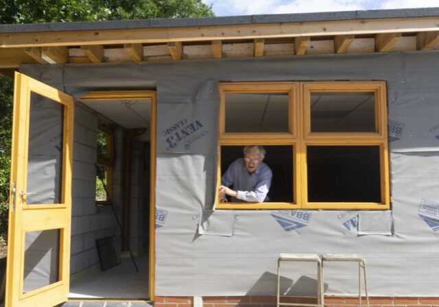 image of school architect Keir Polyblank looking out of the new science block building work
